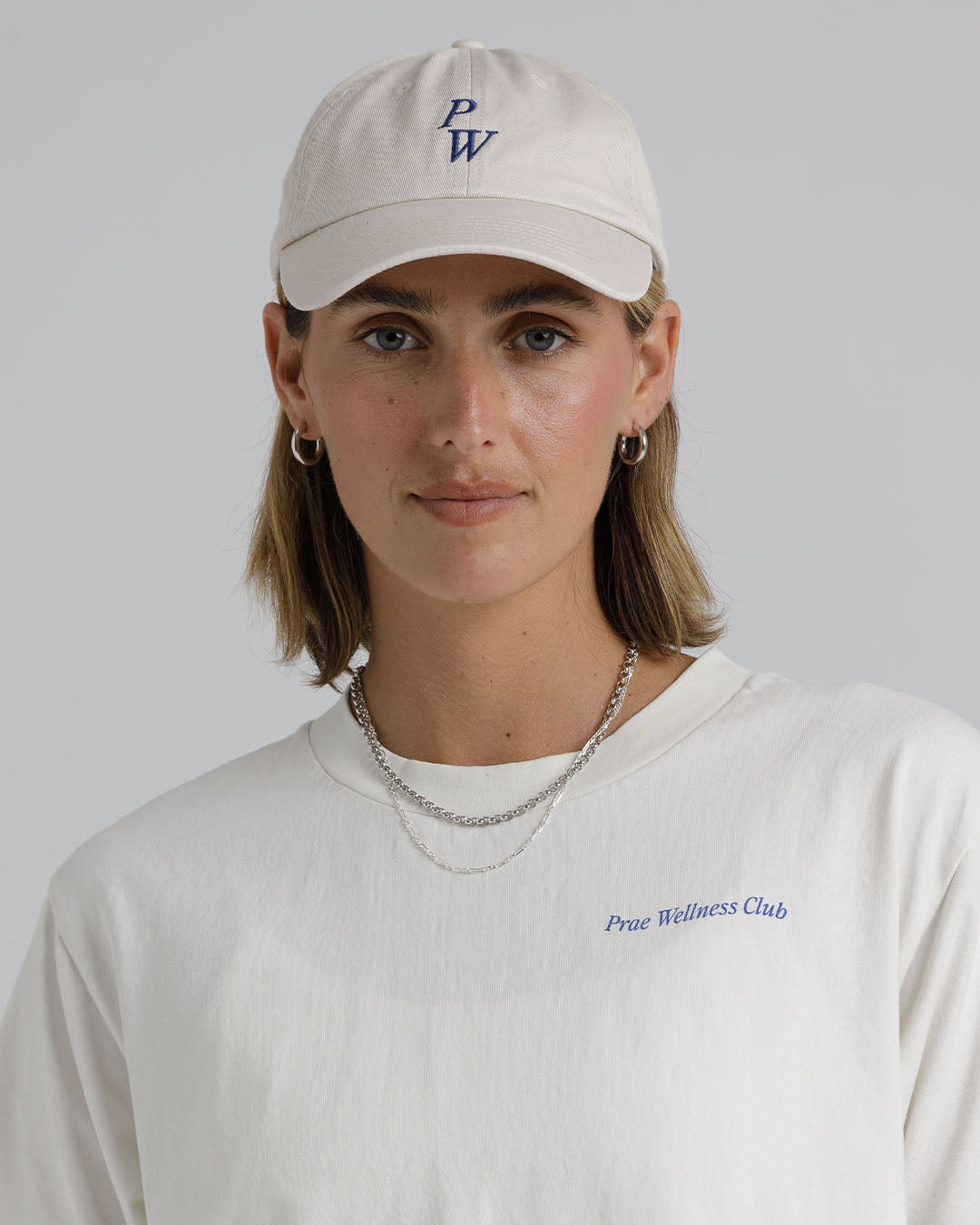 PW Cap – Beige / Royal Blue Hats by Prae Wellness - Prae Store