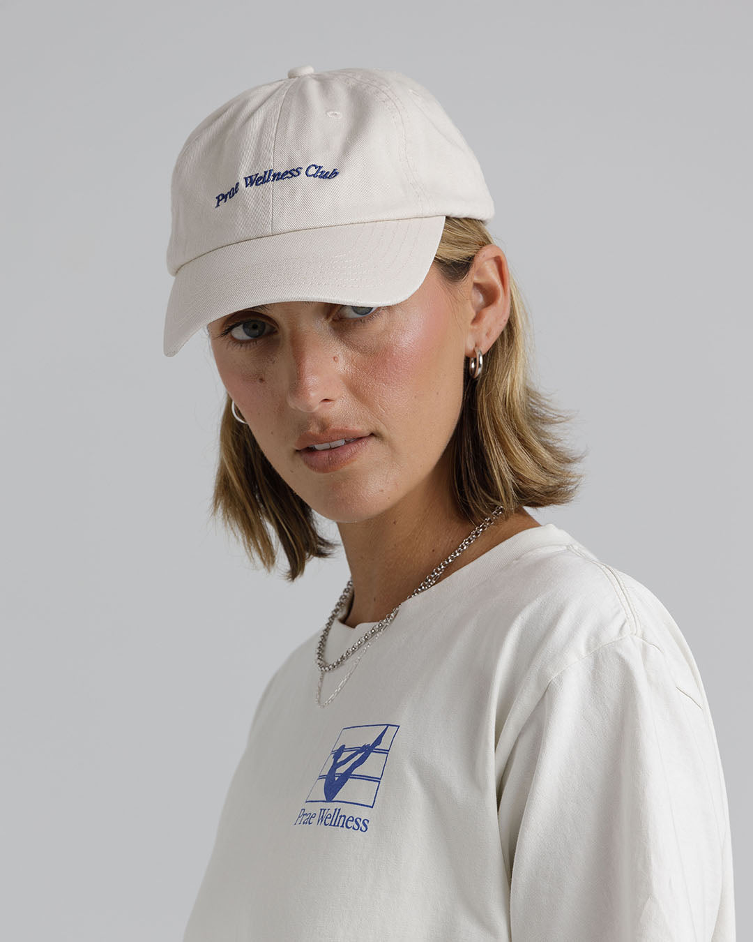 Prae Wellness Club Cap – Beige / Royal Blue Hats by Prae Wellness - Prae Store